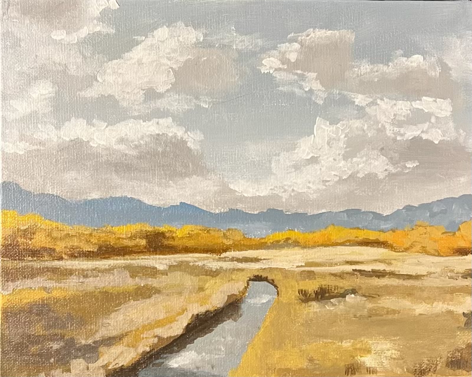 Acrylic landscape painting of golden marsh grasses beside still water with blue hills beyond